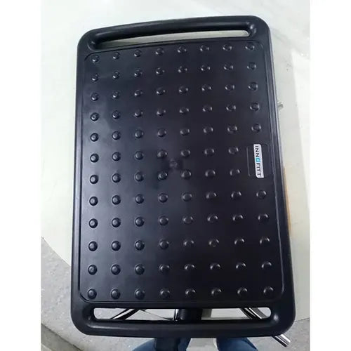 Ergonomic foot rest with adjustable angle for ideal desk seating