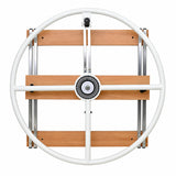 Large wall-mounted shoulder exercise wheel with circular frame and wooden support panel for rehabilitation and mobility training