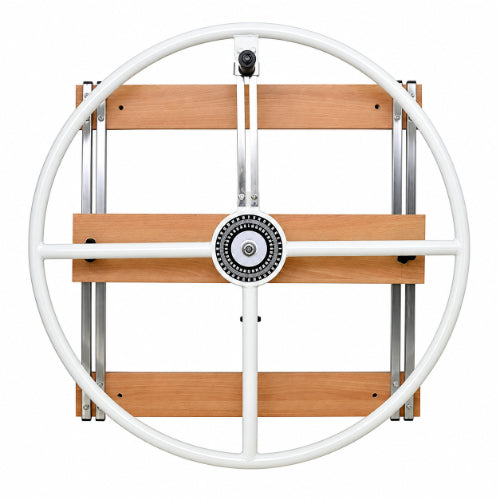 Large wall-mounted shoulder exercise wheel with circular frame and wooden support panel for rehabilitation and mobility training
