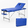 Portable foldable massage table with adjustable backrest, face cradle, arm supports and carry case for therapy and wellness use