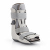 breg mid-calf pneumatic walking boot with adjustable straps, padded liner and hard shell for ankle and foot support