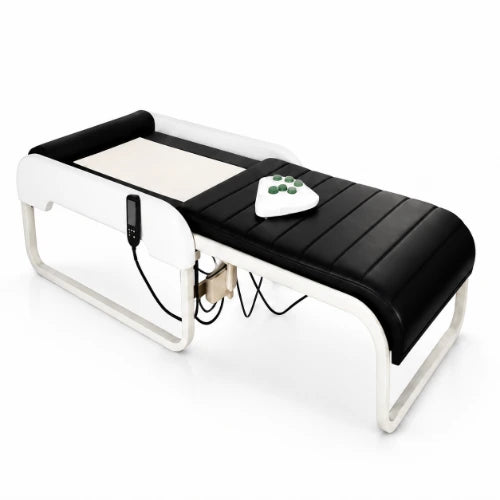 thermal massage bed with pure zade stone, padded surface, handheld controller and sturdy metal frame for relaxation and wellness use
